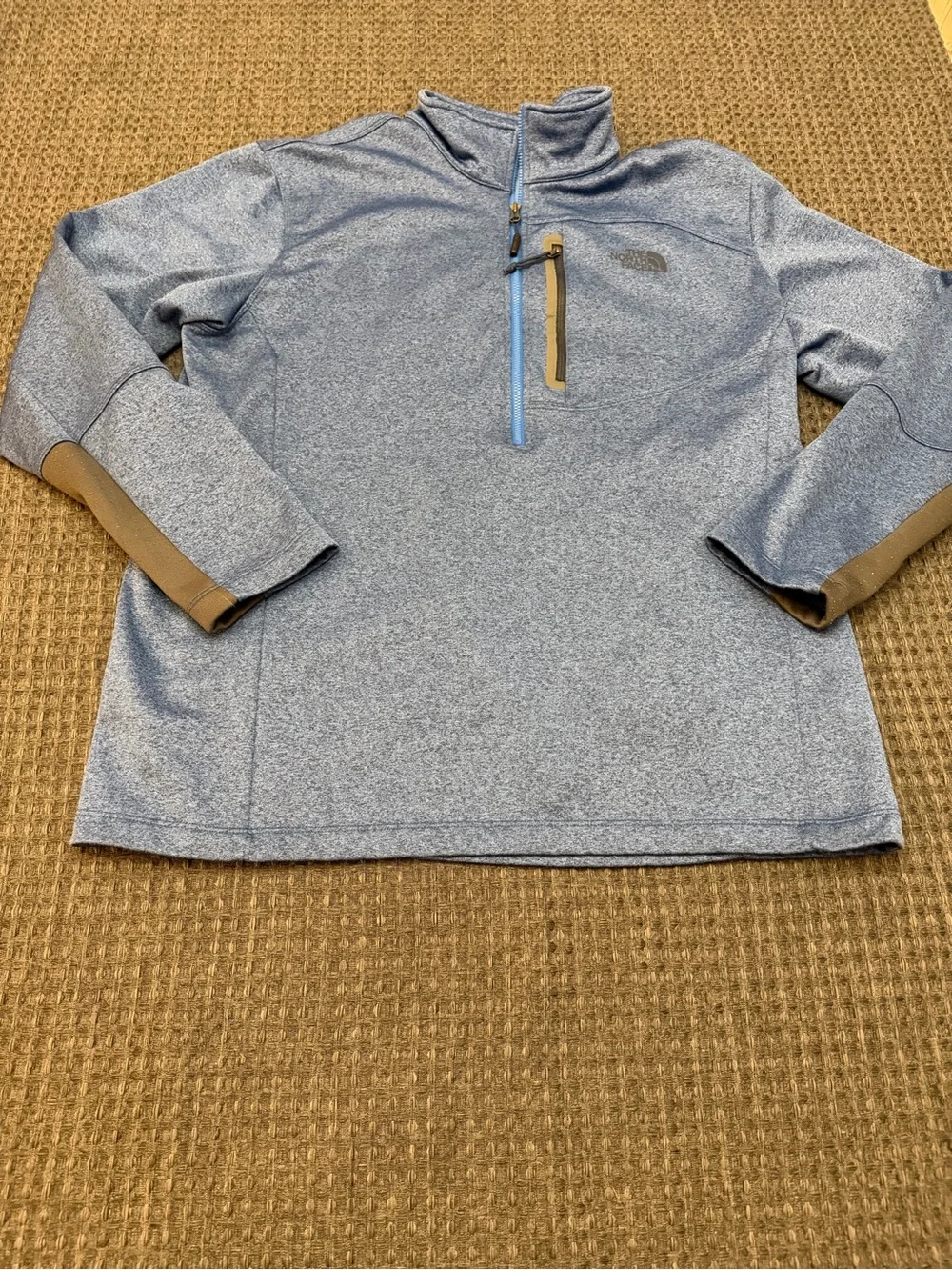 The north face blue 1/4 zip pullover sweater